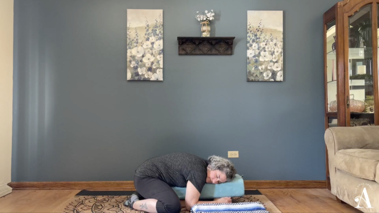 Mindy Minaeri in restorative child's pose